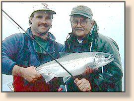 Guide Steve Shelly ready to release Les Johnson coho salmon
