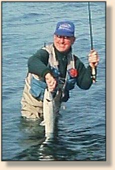 Martin James with his first
salmon in the salt, from the beach Lincoln Park in Seattle