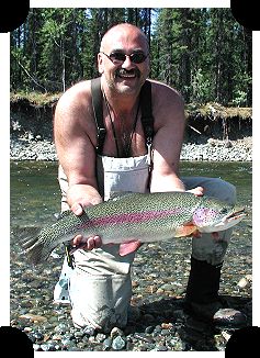 Sonny Traxinger of Anchorage with a 30in. rainbow, Un-named Parks Hiway stream