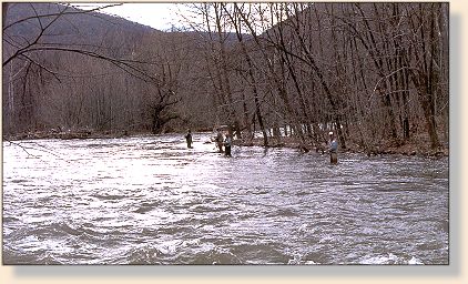 Typical opening weekend: crowded stream, high water