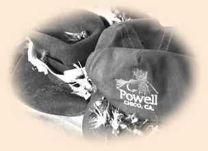 Press Powell's ball cap and his father's
traditional fishing cap.
