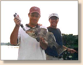 Gerry with a nice black drum, John's happy too