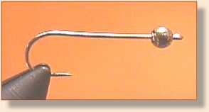Wire inserted into bead