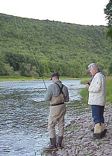 Ray DuBois getting instruction from Ron Kusse