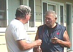 Slic and Ron Kusse discussing a rod