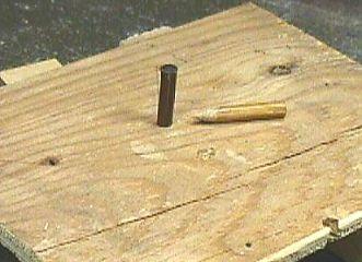 Partially driven into the board