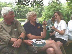 Liz reading off the winner, Carla watching