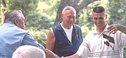 Ray DuBois and his award for 1st Place with the broom