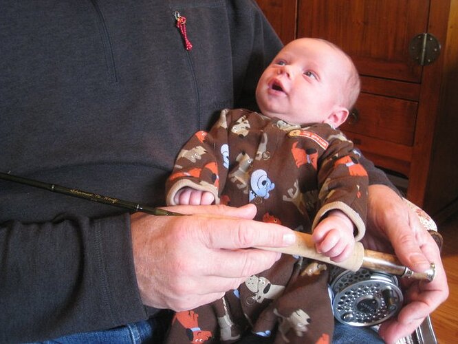 Shamus Patrick Carlisle Houf and Gpa with fly rod and reel Nov 2010.jpg