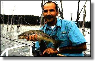 Ray Montoya holding an Aruthurs brown caught during an afternoon black spinner rise.